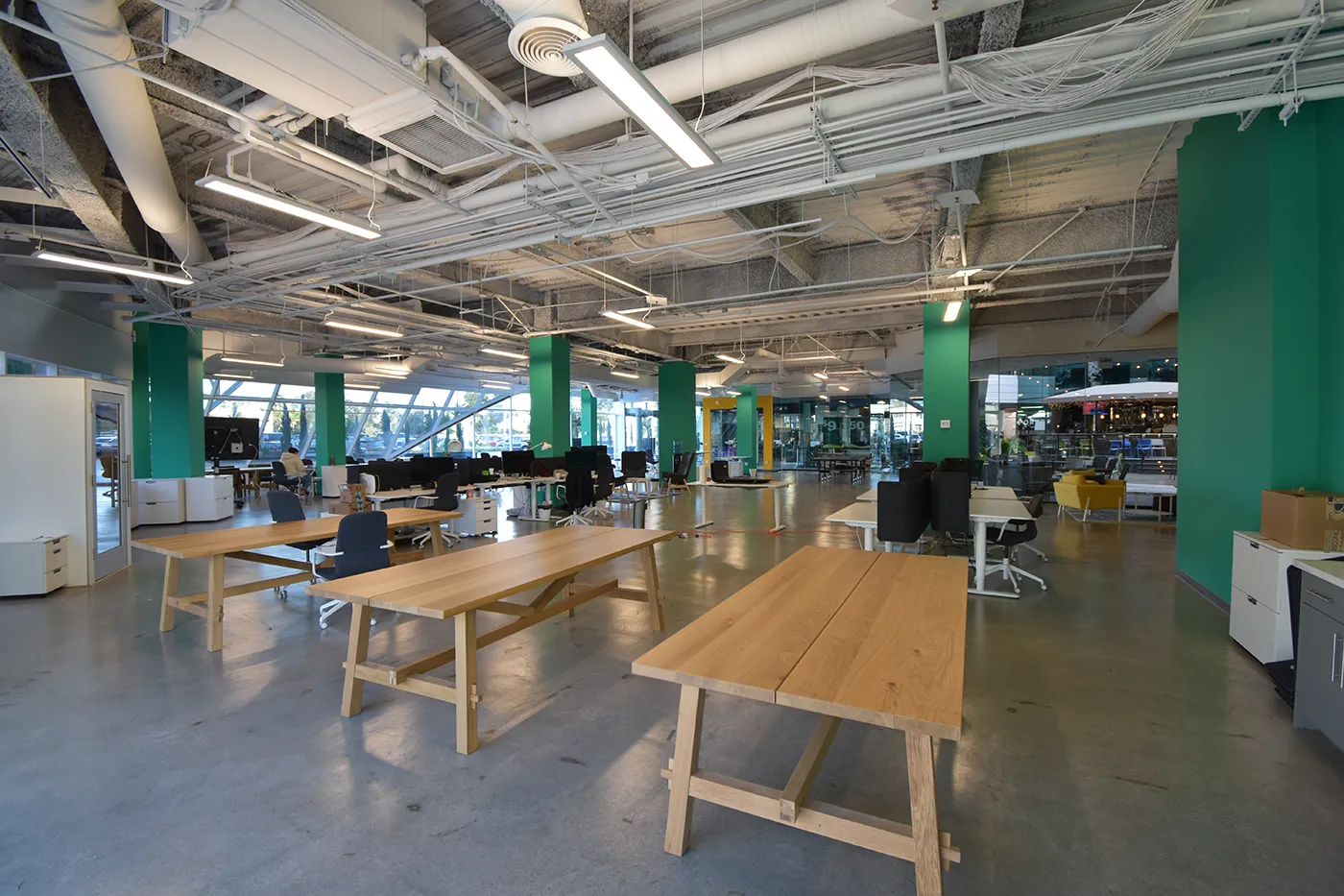 Hanging panel light installed in an open office